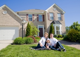 An Austin family in front of their home